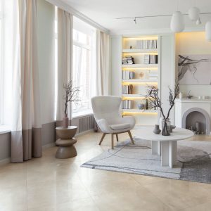 fashionable modern design luxury apartment in light colors. bright day behind huge windows. stylish decoration and no one inside.