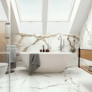 Stylish bathroom interior design with marble panels. Bathtub, towels and other personal bathroom accessories. Modern glamour interior concept. Roof window. Template.